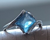 Mid Century Modernist Marked 10K White Gold Ring with Emerald Cut Blue Topaz 1.5 carat size 6