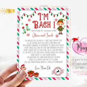Puede incluir: Una carta navideña festiva, de aproximadamente 12,7 cm de ancho y 17,8 cm de alto, con el texto "I'M BACK!" y una ilustración de un elfo. La carta tiene un borde rojo y verde y decoraciones navideñas.