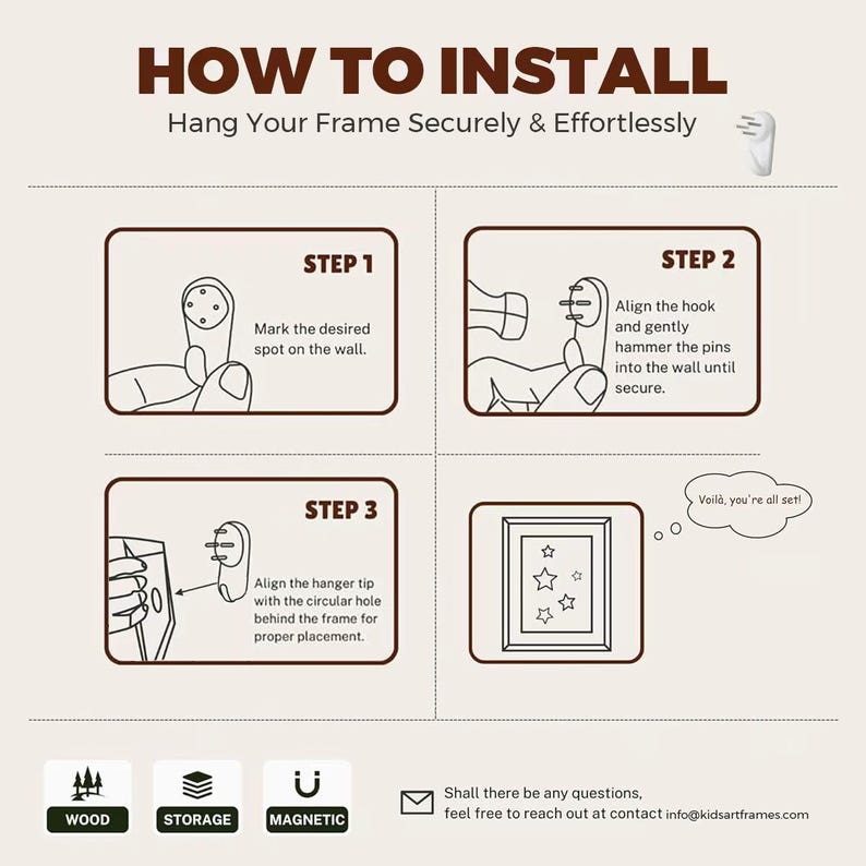 Puede incluir: Un gr&aacute;fico de instrucciones titulado HOW TO INSTALL Hang Your Frame Securely & Effortlessly. Muestra tres pasos para usar un gancho de pared con pines, incluyendo un martillo, un marco y una burbuja de texto que dice Voila, you're all set. Los iconos de madera, almacenamiento y caracter&iacute;sticas magn&eacute;ticas est&aacute;n en la parte inferior.