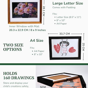 Puede incluir: Dos marcos de fotos rectangulares con profundidad de almacenamiento. Un marco es de color madera con un estampado floral, mide 34,4 cm por 28,1 cm. El otro es negro, mide 33,7 cm por 25 cm, con un dibujo infantil. Un tercer marco muestra 5 cm de profundidad.