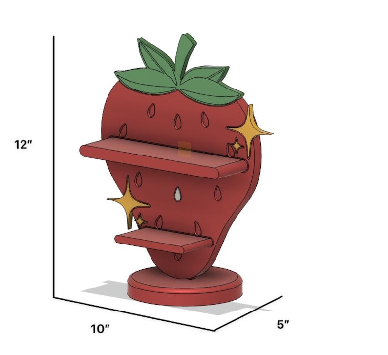 May include: A red strawberry-shaped shelf with two shelves and a green leafy top. The shelf is 12 inches tall, 10 inches wide, and 5 inches deep. Gold star accents are on the side.