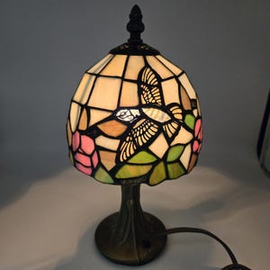 May include: A set of three ceramic mugs with a speckled, matte finish. The mugs are in shades of cream, light gray, and dark gray. Each mug has a simple, minimalist design, perfect for coffee or tea.