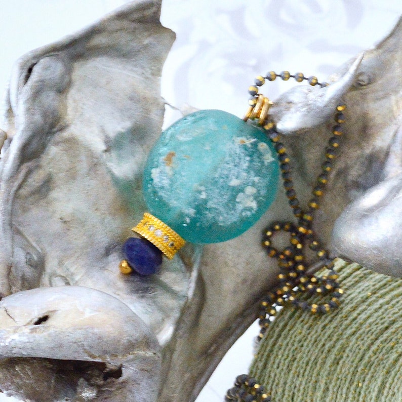 View of Bleu Roman Glass Necklace