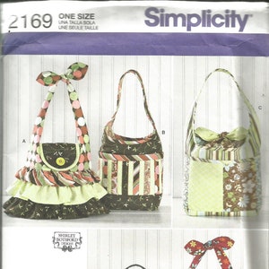 May include: Simplicity sewing pattern featuring several fabric bag designs. The bags vary in shape and size, with details like ruffles, bows, and patchwork. The color palette includes floral, polka dot, and striped patterns. The pattern includes the text "ONE SIZE".