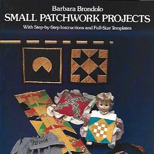 May include: A book cover titled "SMALL PATCHWORK PROJECTS" by Barbara Brondolo, featuring various small patchwork items. The image includes a doll, wall hangings, and other fabric projects with geometric designs in various colors.
