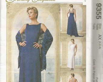 May include: A McCall's sewing pattern for evening gowns. The pattern features several long dresses in different styles, including a navy blue dress with a matching shawl, a white dress, and a pink dress. The pattern is labeled "Evening Elegance".