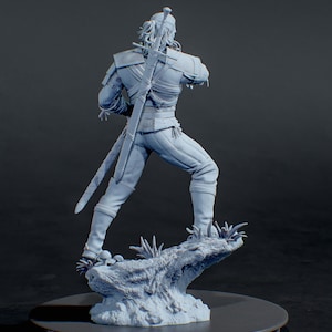May include: A light gray resin figurine of a warrior standing on a textured base with small mushrooms. The figure has long hair, wears detailed armor, and carries a long sword strapped to the back. The text HOBBY TEKA3D is visible at the bottom.