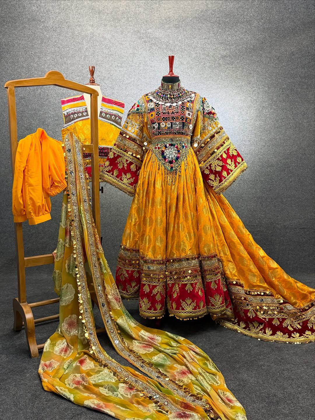 Royal Afghan Bridal Dress in Golden and Red with Handcrafted Mirror Work with long veil