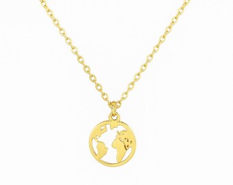 May include: Gold-colored necklace featuring a pendant with a globe design. The pendant is a circular outline of the Earth's continents. The necklace has a delicate chain. The brand name "MONNKA" is displayed below the necklace.