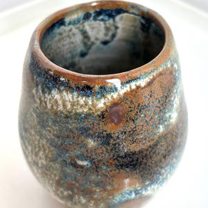 Small glazed ceramic vase in wabi-sabi style by Eric Ruelland