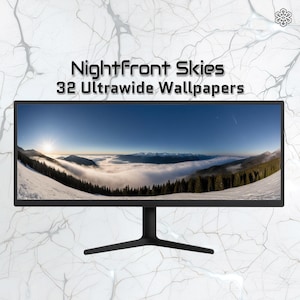 May include: A black ultrawide computer monitor displaying a scenic landscape of snow-covered mountains, trees, and a bright blue sky. The text "NightFront Skies 32 Ultrawide Wallpapers" is displayed at the top of the monitor.