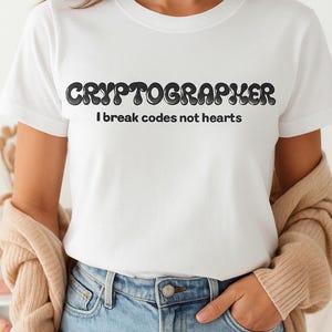 Cryptographer T-Shirt - Funny Coding Tee | “I Break Codes Not Hearts” Shirt | Gift for Programmers, Coders & Tech Lovers