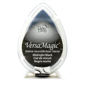 May include: A teardrop-shaped ink pad in a clear plastic case. The ink is Midnight Black, with the brand name VersaMagic printed on the front. The text "Chalk Ink" and other details are also visible.