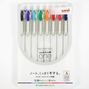 May include: A package of eight Uni-ball One gel pens in a clear plastic case. Each pen has a different color ink: black, purple, light blue, green, orange, red, pink, and dark blue. The packaging includes Japanese text and the Uni-ball One logo.