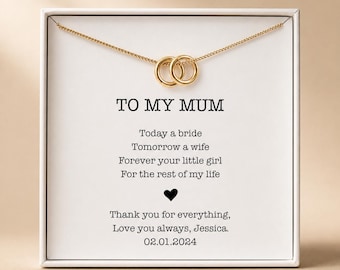 May include: A gold-toned necklace with two interlocking circular rings displayed in a white gift box. The card features the text: TO MY MUM, Today a bride, Tomorrow a wife, Forever your little girl, For the rest of my life, a heart, and 02.01.2024.