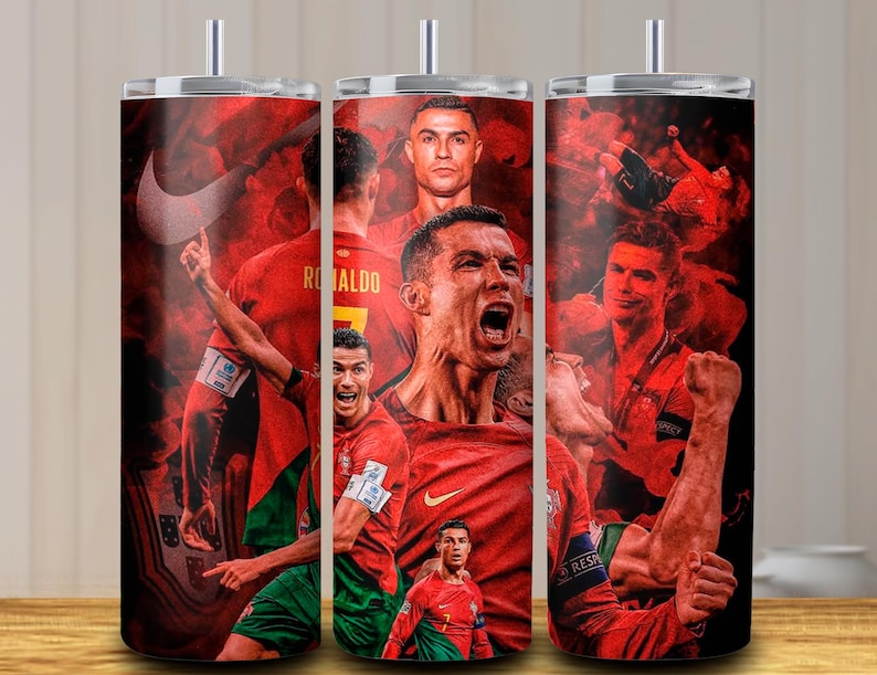 May include: A set of three stainless steel tumblers featuring a red and black design with images of a soccer player. The tumblers have a glossy finish and a silver lid and straw.