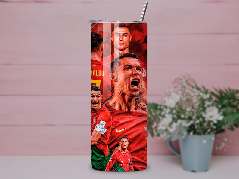 May include: A stainless steel tumbler featuring a collage of images of a soccer player in a red uniform. The design includes multiple portraits of the player in various action poses, with the name "Ronaldo" visible.