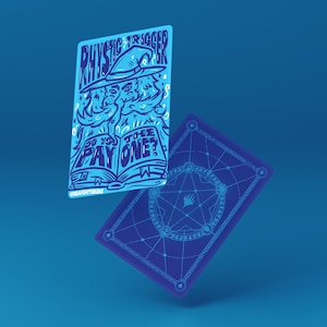 May include: Two blue playing cards. One card features a wizard illustration with the text "Rhystic Trigger" and "Do you pay one?" The other card has a geometric design. The cards are set against a blue background.