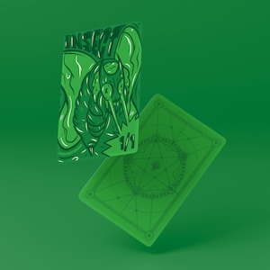 May include: Two green playing cards with an insect illustration. One card features the word "INSECT" and a detailed insect graphic. The other card has a geometric design. Both cards have a 1/1 marking.