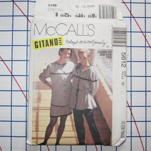 May include: A sewing pattern for two tops, one with a button-up front and the other with a drawstring waist. The pattern is from McCall's and is called Gitano. The pattern is for size 10.