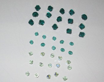 Set of 40 Swarovski beads in different shades of green, different sizes