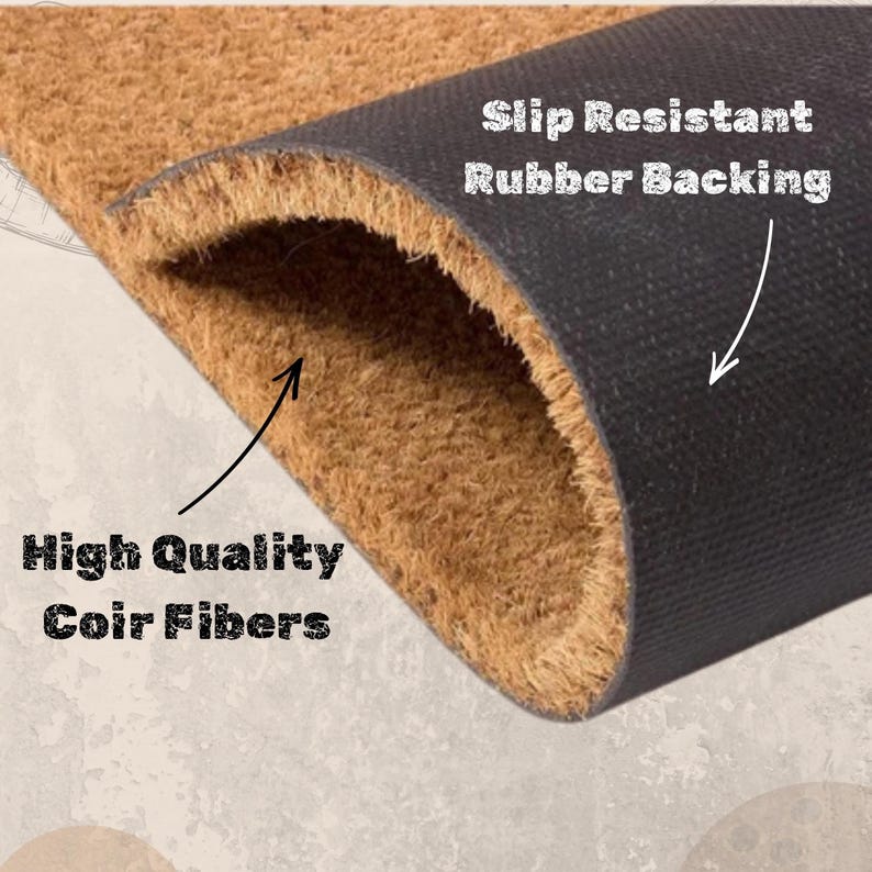 May include: Close-up of a doormat with a brown coir fiber surface and a black rubber backing. Text on the mat reads "High Quality Coir Fibers" and "Slip Resistant Rubber Backing".