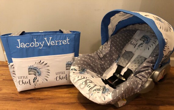 infant headsupport and matching strap covers baseballs with red minky sports