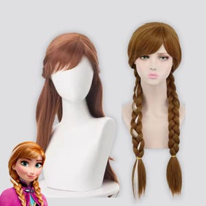 May include: Two brown wigs with long braids, styled to resemble a character from a popular animated film. One wig is displayed on a mannequin head, the other on a bust. A cartoon image of the character is also present.