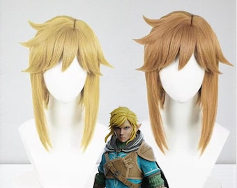 May include: Two blonde wigs and a figurine of a video game character. The wigs are on white mannequin heads. The figurine is wearing a blue tunic and holding a sword.