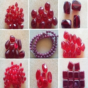 May include: Assortment of red glass beads in various shapes and sizes, including round, oval, square, and teardrop. The beads are perfect for jewelry making, crafting, and home decor.