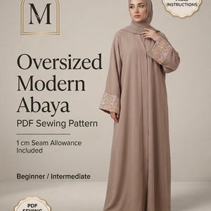 May include: An oversized modern abaya PDF sewing pattern by Marya Patterns. The garment is a solid light brown, floor-length robe with long sleeves featuring floral embroidery at the cuffs. Includes matching hijab instructions and 1 cm seam allowance.