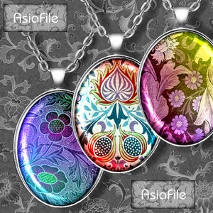 May include: Three silver chain necklaces with colorful glass pendants featuring floral and geometric patterns. The pendants are round and have a glossy finish.