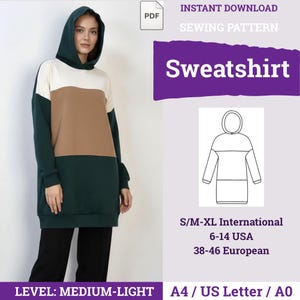 Può includere: Un cartamodello PDF per una felpa con cappuccio color-block. Il design presenta cappuccio, maniche e parte inferiore verde scuro con un pannello pettorale beige e una sezione superiore color crema. Include disegni tecnici e taglie S/M-XL.