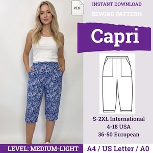 Peut inclure: Un patron de couture numérique pour pantacourt Capri avec un motif floral bleu et blanc. Le graphique inclut le texte 'INSTANT DOWNLOAD SEWING PATTERN Capri', 'S-2XL International', '4-18 USA', '36-50 European' et 'LEVEL: MEDIUM-LIGHT'.
