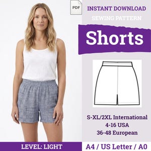 May include: A woman wearing a white tank top and blue shorts. The image includes a sewing pattern for shorts, with the text "Shorts" in a purple banner. The pattern is for sizes S-XL/2XL, 4-16 USA, and 36-48 European.