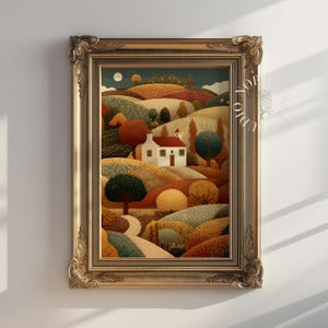 Op de afbeelding: Een ingelijst landschapsschilderij toont een wit huis met een rood dak in een landelijke omgeving. Het kunstwerk gebruikt een warm kleurenpalet van herfsttinten, met bomen en een kronkelend pad. De sierlijke gouden lijst voegt een vleugje elegantie toe.