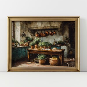 May include: A framed wall art print depicting a rustic kitchen scene with a wooden table, potted herbs, and copper cookware hanging from a stone hearth. The room features teal cabinets, terracotta floor tiles, and a warm, natural light source.