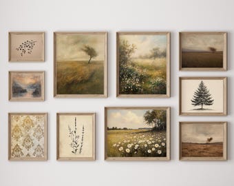 May include: A set of framed landscape art prints. The prints depict fields, trees, and floral arrangements. The colour palette is muted, with earthy tones and soft lighting. The frames are a light wood colour.