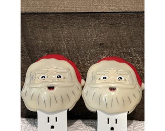 Lotto di 2 timer per prese elettriche GE da 24 ore, modello GE5101, con copertura a forma di volto di Babbo Natale.