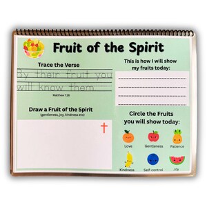 May include: A spiral-bound activity book with a green cover titled "Fruit of the Spirit." The book includes prompts to trace a verse, draw a fruit, and circle fruits like love, gentleness, and patience. The text "By their fruit you will know them" is visible.