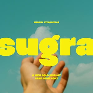 May include: Yellow "sugra" font against a blue sky background with a hand reaching up. The text "MADE BY TYPORAITH CO" is above the word "sugra". Below the word "sugra" is the text "A NEW BOLD DISPLAY SANS SERIF FONT".