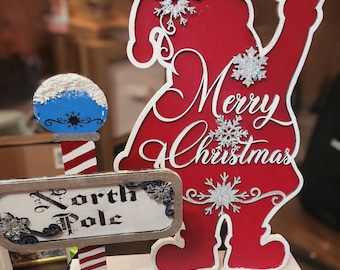 Silhouet van de kerstman met bord Noordpool