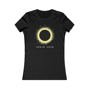May include: Black women's t-shirt with a yellow sun graphic and the text "SPAIN 2026" printed on the front.