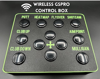 May include: Black control box with green trim and buttons labelled "PUTT", "HEATMAP", "FLYOVER", "SHOTCAM", "CLUB UP", "AIMPOINT", "CLUB DOWN", and "MULLIGAN". The text "WIRELESS GSPRO CONTROL BOX" is at the top, with a Wi-Fi symbol.