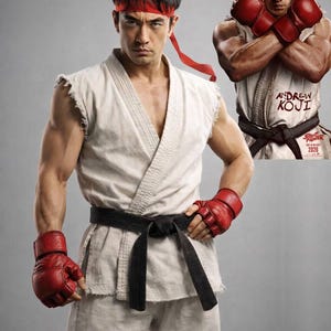 May include: A man in a white karate uniform with a black belt and red gloves and headband. The image includes a promotional image for the movie "Street Fighter" with the actor Andrew Koji.