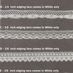 May include: Five samples of white lace trim, labelled A to E. Each sample is a different style of lace, with varying widths and patterns. The text above each sample indicates the width of the lace in inches. All lace is white.