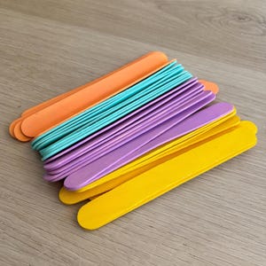 Wooden popsicle sticks for crafts colorful wood sticks for schools and crafters popsicle sticks. Pre-painted wood sticks for arts and crafts