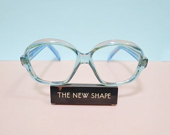 1970s Blue transparent deadstock unusual eye glasses frames , 70s 80s Okula clear light turquoise avant garde spectacles