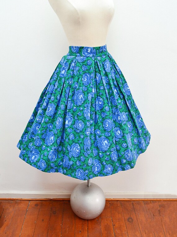 green pleated skirt 50s