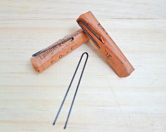 French Edwardian unopened pack of long metal hair pins , Victorian antique bobby grips in orange paper packaging